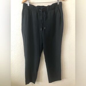 Lululemon Womens On The Fly Pant in Black - Size 10